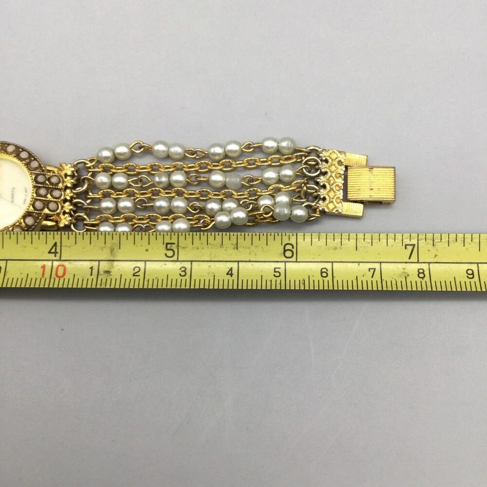 Futura Womens Watch 25mm MOP Dial Gold Tone Faux Pearl 3216 New Battery 6.75